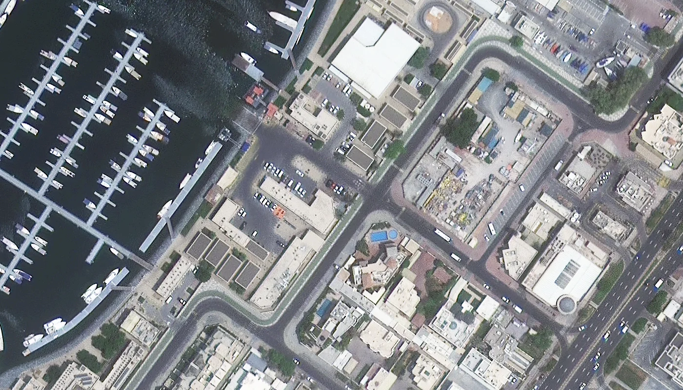High-resolution satellite image of a Dubai marina and waterfront district