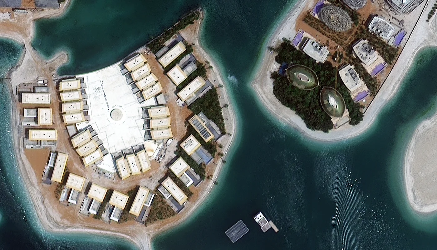 High-resolution satellite image of a villa development on World Island, Dubai