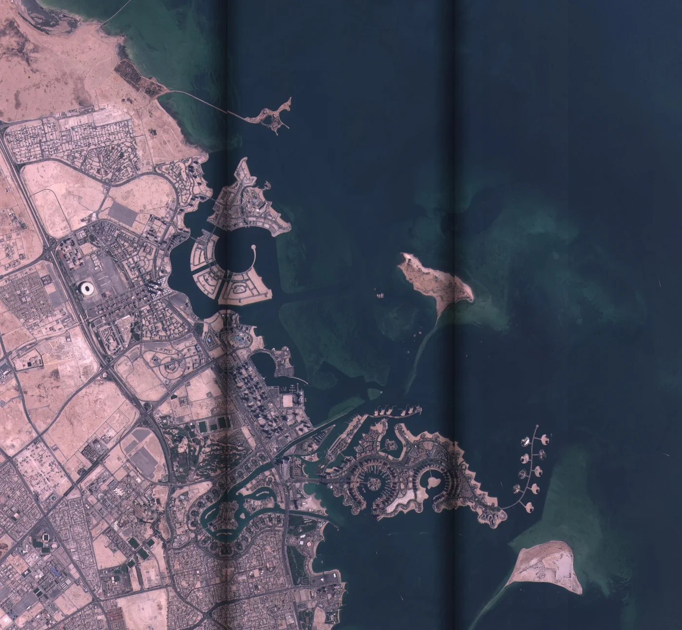 Satellite image of Doha, Qatar, showing West Bay, The Pearl-Qatar, and offshore artificial islands