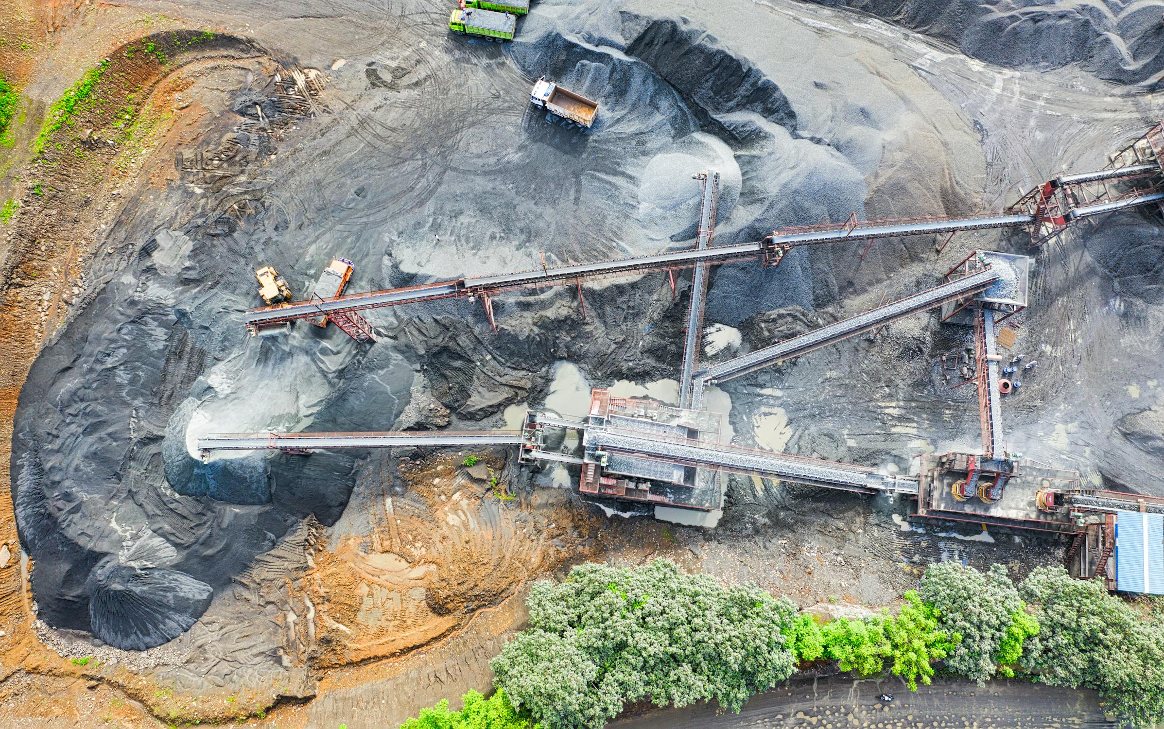 Satellite and geospatial imagery of an open-pit mine used for mining and mineral exploration