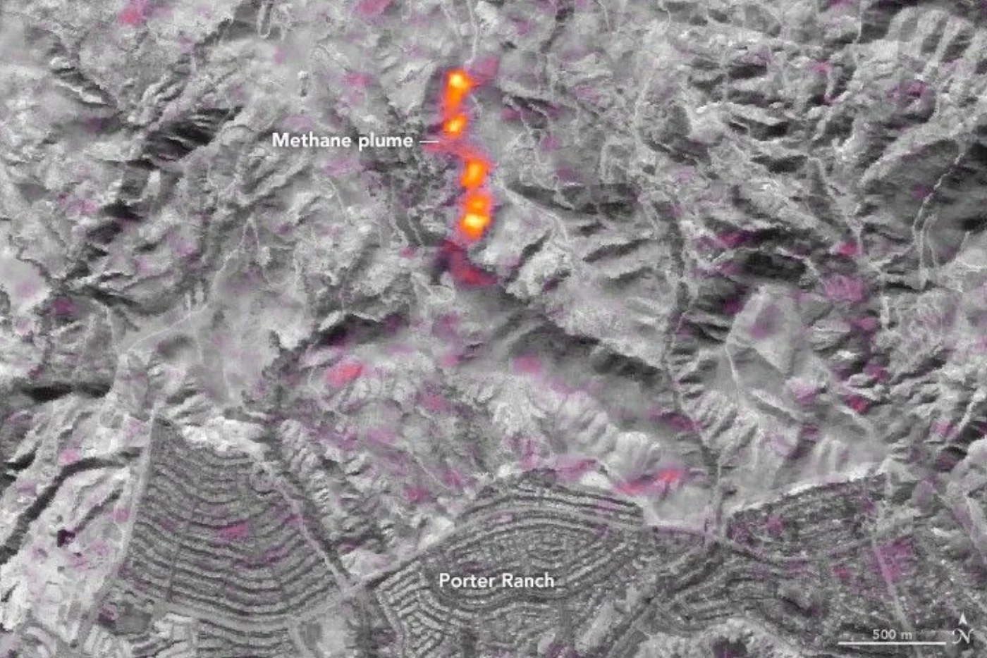 Satellite hyperspectral image from NASA's EO-1 Hyperion instrument showing a bright orange and red methane plume signature over the Aliso Canyon gas storage facility near Porter Ranch, California