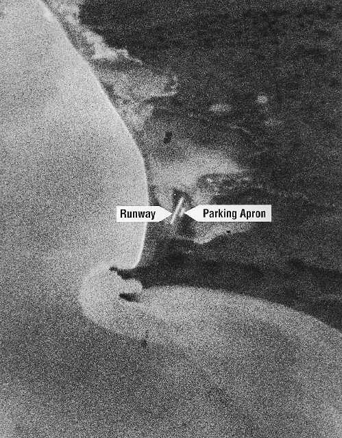 The first satellite reconnaissance photograph, taken by the CIA and US Air Force's Corona satellite on August 18 1960, showing the runway and parking apron of Mys Shmidta airfield in the USSR