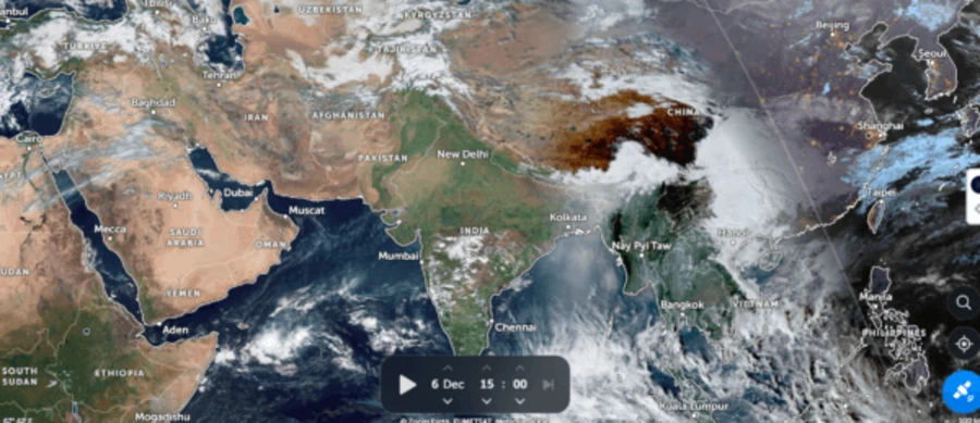 Zoom.Earth interface showing a near real-time global satellite weather map over the Middle East and Asia