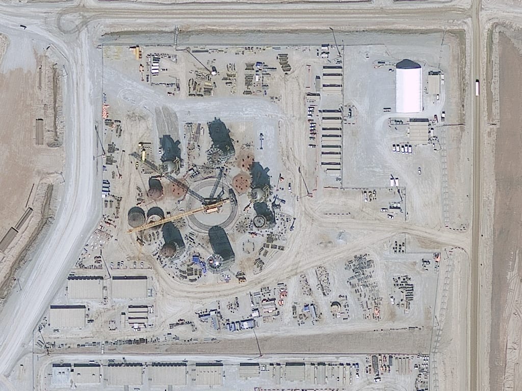 GeoEye-1 satellite imagery of a construction site used for progress tracking and earthworks survey