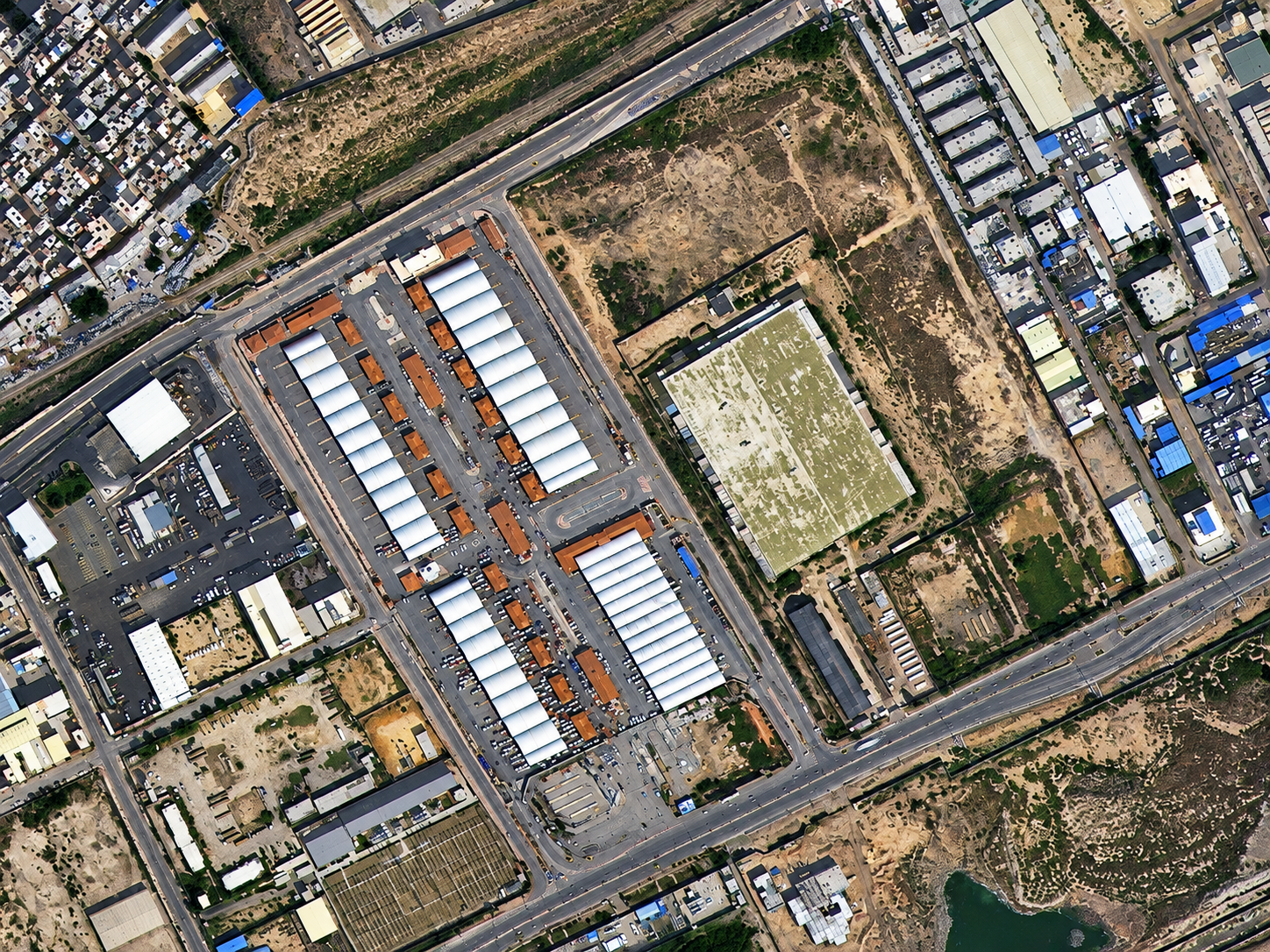 High-resolution satellite image of a warehouse and logistics district in Alexandria, Egypt