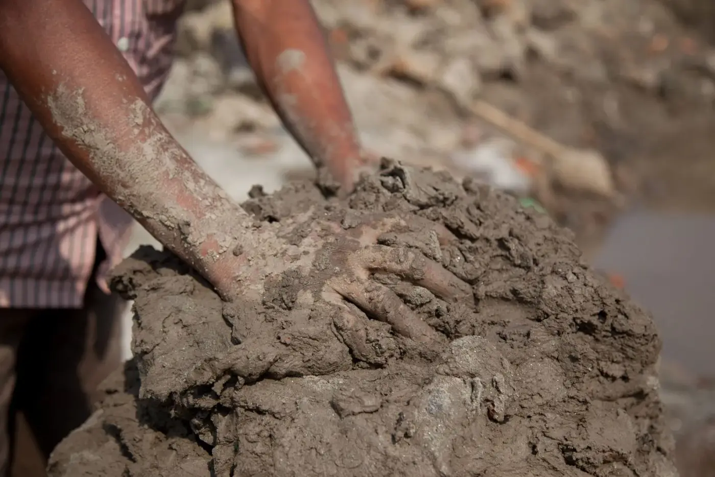 Dense, compacted clay soil texture with fine, tightly packed particles